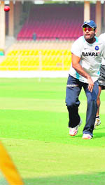 MS Dhoni and Suresh Raina (R) during a practice session at The Sardar Patel Gujarat stadium in Ahmedabad on Tuesday