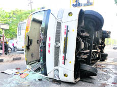 The private bus that overturned after an accident at the intersection of Sector 49-50, 45-46 in the wee hours of Wednesday.
