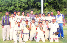 The Abhimanyu Cricket Academy team with the Under-17 District Level Cricket Tournament trophy in Dehradun on Wednesday.