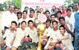 St Joseph Academy football team pose with the ONGC Ram Bahadur Chetri Memorial Inter-School Football Championship trophy in Dehradun on Wednesday. 
