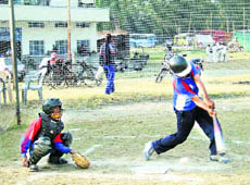 A match of the Dist-Level Baseball Championship being played in Dehradun on Wednesday.
