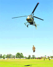 Army personnel take part in a mock exercise, Mountain Rescue, at Annandale in Shimla on Wednesday.