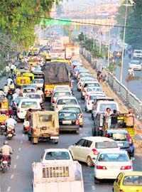 Serpentine queues of vehicles on the road leading to the Jagraon bridge in Ludhiana on Wednesday