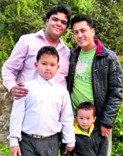 Ugyen Kyab with his two sons and their Indian friend.