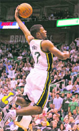 Utah Jazz point guard Ronnie Price goes for a dunk against the Toronto Raptors during the second half of their NBA game in Salt Lake City, Utah on Wednesday.