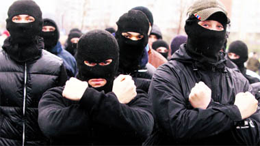 Russian ultra-nationalists march during a demonstration on the outskirts of Moscow on Thursday.