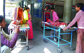 Helpless patients wait outside the OPD of the Deen Dayal Upadhayaya Hospital as doctors go on strike against the alleged manhandling by patients relatives on Saturday.