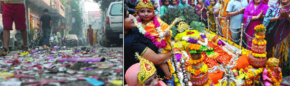 Burnt firecrackers cover a road in New Delhi on Saturday; (Right) Devotees participate in Govardhan Puja organised by the Yuva Sanskritik Sangathan at Arya Pura Ghantaghar in New Delhi on Saturday.