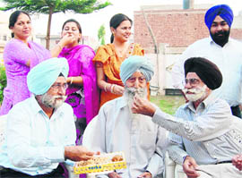 Nikkis relatives celebrate in Amritsar.