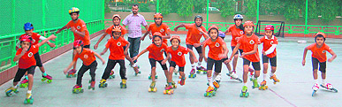 Being put through their paces: Young skaters practise at an academy in Panchkula.