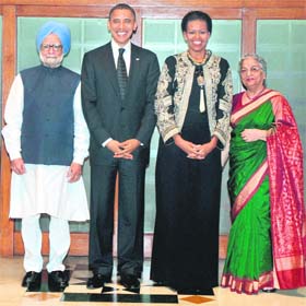 President Barack Obama and Michelle with Prime Minister Manmohan Singh and Gursharan Kaur at the dinner in New Delhi on Sunday