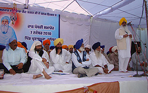 Education Minister Sewa Singh Sekhwan speaks at a function on the birth anniversary of Baba Sein Bhagat at Partappura village in Phillaur on Sunday.