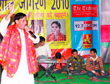 A singer sings devotional songs at Jagran 2010 at Karan Nagar in Jammu on Saturday