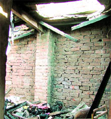 The burnt remains of the house of septugenarian OP Chopra, a paralytic, who was burnt alive in his sleep in Ludhiana on Saturday
