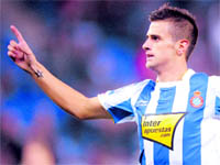 Espanyol's Javi Marquez celebrates his goal against Malaga at the Cornella-El Parat Stadium in Cornella on Saturday