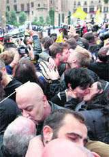 Homosexual couples kiss in the Plaza de la Catedral in Barcelona on Sunday. 