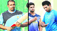 Karnatakas Robin Uthappa and Punjabs Yuvraj Singh during a practice session for the forthcoming Ranji match in Mohali 