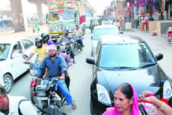 Wrongly parked vehicles and encroachments along the Chandigarh-Ambala highway at Zirakpur