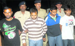 The four persons accused of robbery in police custody in Chandigarh