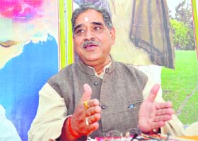 Shashikant Dixit of the RSS addresses a press conference in Dehradun
