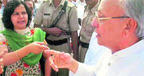An angry Chief Parliamentary Secretary, Sharda Rathore, argues with Power Minister Mahender Partap at a function in Faridabad on Monday.