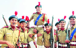 Jubilant cadets of the first batch of the Indian Reserve Battalion at Sunarian village in Rohtak on Monday.