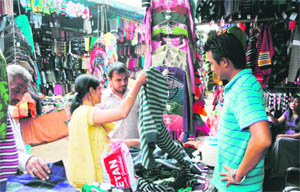 Residents shop for winter garments at Tibet market in Faridabad.