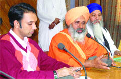 Deputy Commissioner Priyank Bharti along with Baba Balbir Singh Seechewal at a meeting in Jalandhar on Monday. 