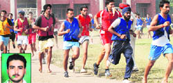 Aspirants take part in a race during a recruitment drive by the Punjab Police at Government College, Phase VI, Mohali, on Monday. (Inset) Amrit Pal, who died while taking part in a 1,600m race.
