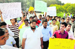 Supporters of the ABVP stage a protest outside the VC office at PU, Chandigarh, on Tuesday
