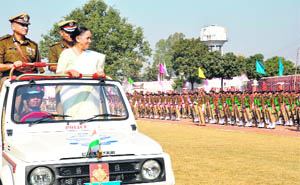 Governor Margaret Alva inspects a guard of honour at a police parade in Dehradun on Tuesday. 