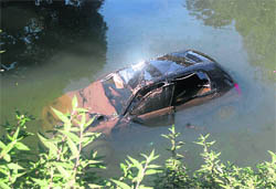 A car which plunged into a water tank on the outskirts of Kangra