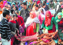 A heavy rush at a market in Srinagar on Tuesday.
