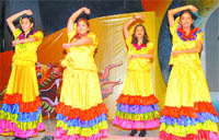 Students of MGN School present a dance during their annual prize distribution function.