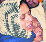 Harpal Kaur, the inconsolable wife of Jaspal Singh, at her husbands cremation in Ludhiana on Tuesday