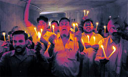 Residents of Paras Ram Nagar hold a protest against the railway authorities for not providing adequate lighting inside the newly constructed railway underbridge in Bathinda on Tuesday