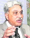 Dr Shailesh Nayak speaks at a seminar in Dehradun