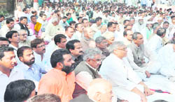 RSS leaders and activists stage a protest in Haridwar on Wednesday. 