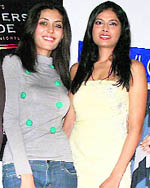 Models Shreya Kusgire (left) and Priyanka Shah strikes a pose in Ludhiana on Wednesday