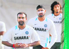 Amit Mishra (L), Harbhajan Singh (C) and Ishant Sharma line up for bowling during a training session at the Rajiv Gandhi International Cricket Stadium in Hyderabad on Wednesday.