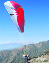 A pilot takes off during the Himalayan Open Paragliding Championship at Billing in Kangra valley on Thursday.