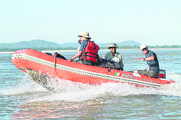 The expedition team during its journey on Brahmputra. 