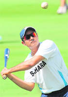 Virendra Sehwag hits a ball during a training session at Rajiv Gandhi International cricket stadium in Hyderabad on Thursday. The match begins at 9.30 am on Friday.