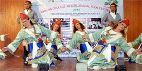 Members of Polymorfi Folk Ensemble from Greece perform a dance at the Khalsa College International Folk Festival in Amritsar