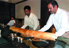 A five-foot dosa being served at the food joint that was inaugurated on the Bathinda-Goniana road on Friday.