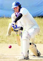 A batsman plays a defensive shot at the Chaudhary Charan Singh Memorial Twenty20 Cricket Tournament in Dehradun on Friday