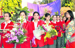 Students of Convent of Jesus and Mary wait for the chief guest of the school annual function in Dehradun on Friday