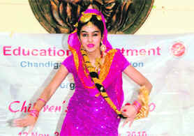 A girl performs during the Childrens Day function at GMSSS-10 in Chandigarh.