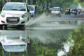 A waterloggged road after the rain in New Delhi on Saturday.