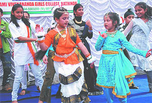 Children presenting a cultural programme during a function organised to mark the Children's Day in Bathinda on Sunday. 